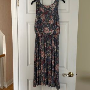 Dress with grey background and colorful flowered design. The Loft outlet. Small